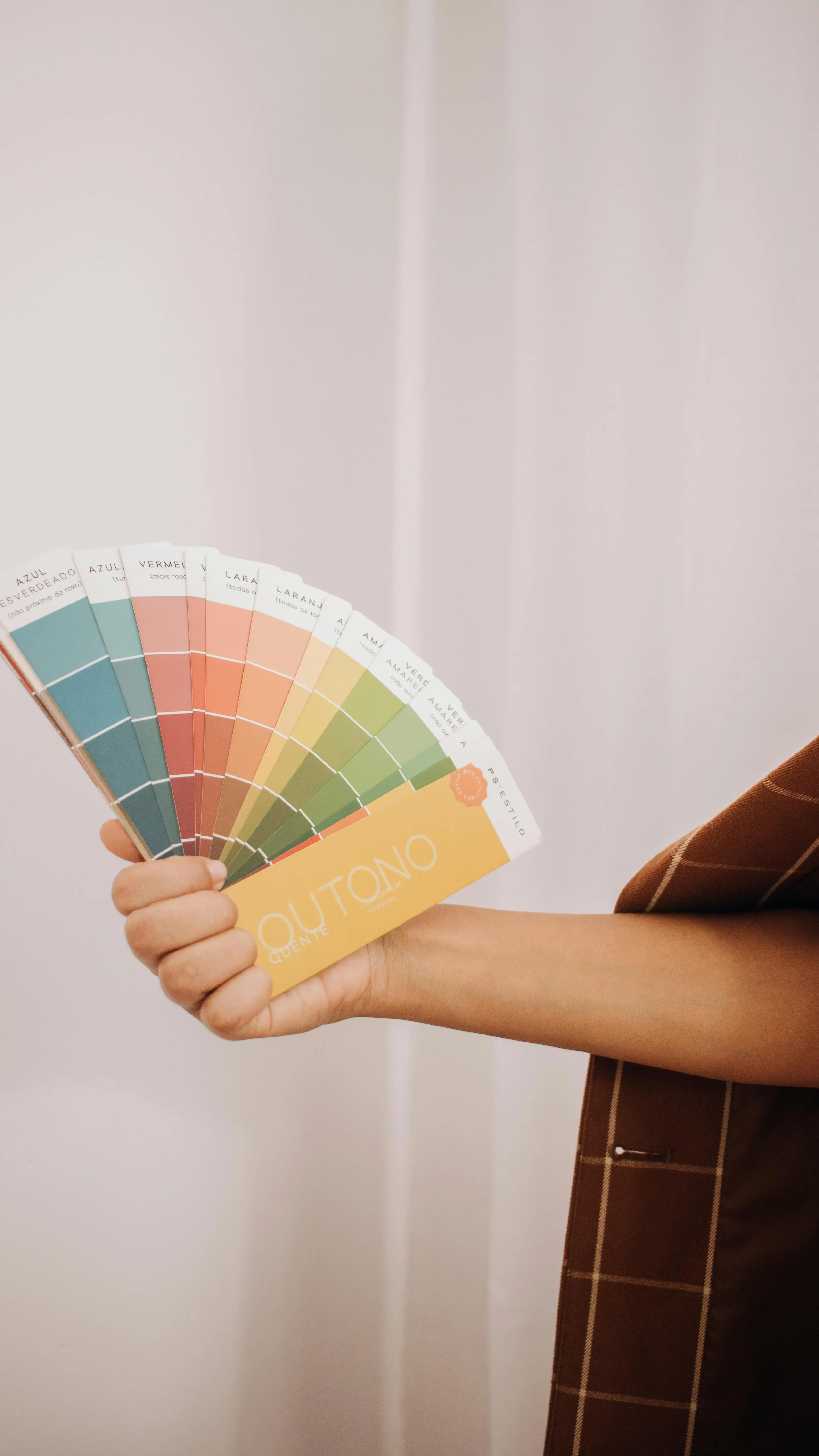 Reviewing color palettes during the planning stage of a BTO renovation to bring the design vision to life